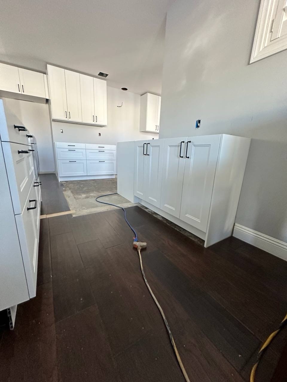 Full white kitchen installation — photo 10